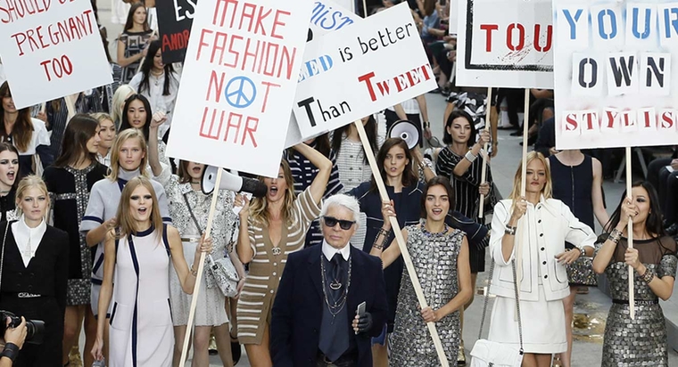 Chanel's Karl Lagerfeld turns the Grand Palais into a feminist protest in 2014...