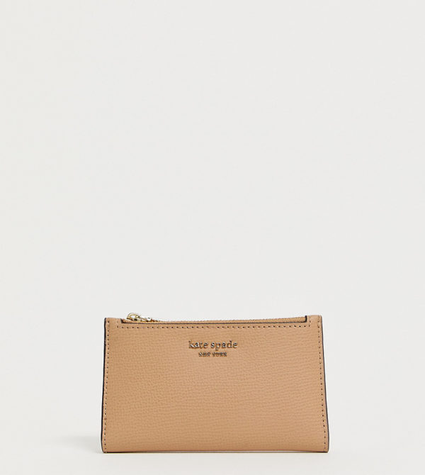 Kate Spade slim beige foldover purse with zip top fastening